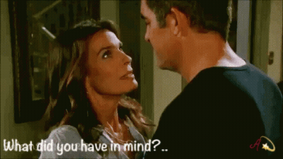 Man And Woman Looking At Each Other Saying What Did You Have In Mind GIF
