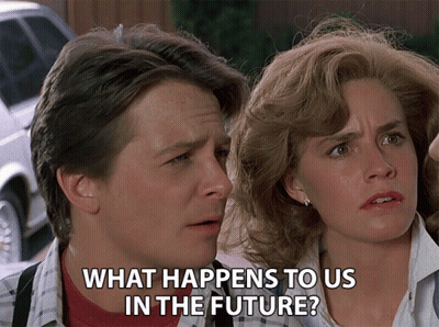Man And Woman Looking At Each Other Saying What Happens To Us In The Future GIF
