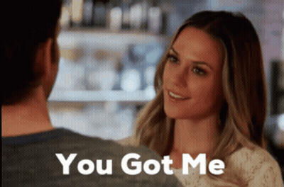 Man And Woman Looking At Each Other Saying You Got Me GIF