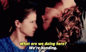 Man And Woman Looking At Each Other Says What Are We Doing Here We're Bonding GIF