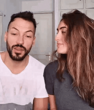 Man And Woman Looking At Each Other GIF