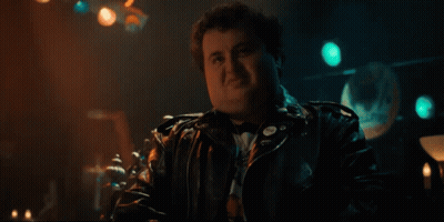 Man And Woman Looking At Each Other Smiling GIF