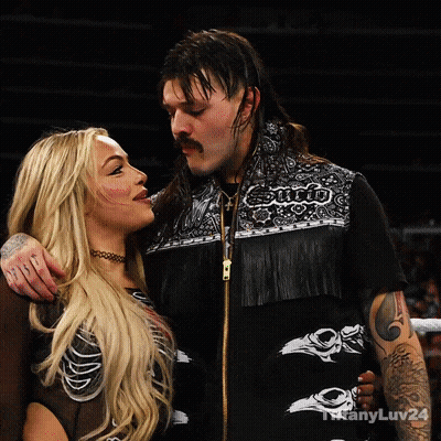 Man And Woman Looking At Each Other Sumo Vest GIF