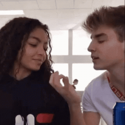 Man And Woman Looking At Each Other GIF