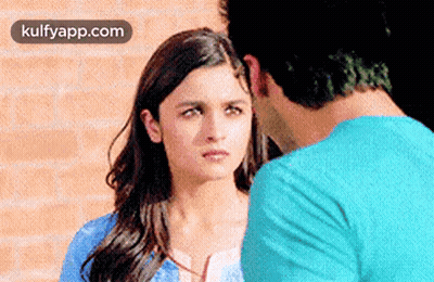 Man And Woman Looking At Each Other GIF