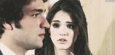 Man And Woman Looking At Each Other With Matarazzo Watermark GIF