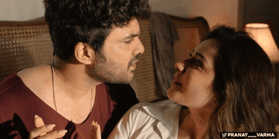 Man And Woman Looking At Each Other With Pranay And Varma GIF