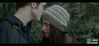 Man And Woman Looking At Each Other Woman In Knitted Hat GIF