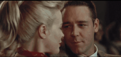 Man And Woman Looking At Each Other, Woman In Red Scarf GIF