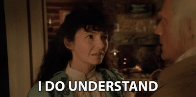 Man And Woman Looking At Each Other Woman Says I Do Understand GIF