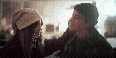 Man And Woman Looking At Each Other Woman Wearing Hat GIF