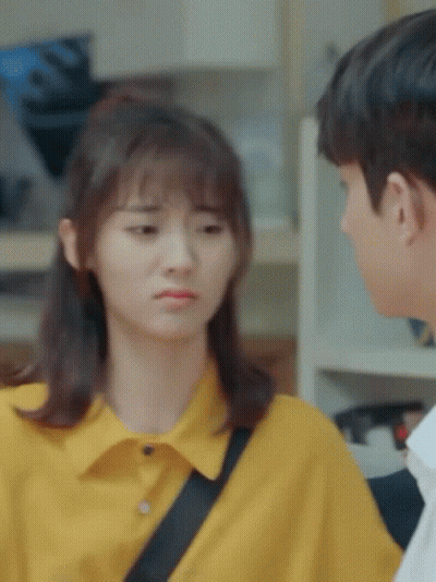 Man And Woman Looking At Each Other Woman Yellow Shirt GIF