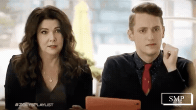 Man And Woman Looking At Tablet GIF