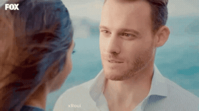 Man And Woman Looking Into Each Other's Eyes GIF
