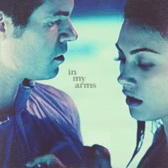 Man And Woman Looking Into Each Other's Eyes GIF