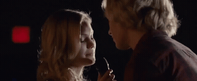 Man And Woman Looking Into Each Other's Eyes GIF
