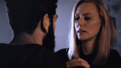 Man And Woman Looking Into Each Other's Eyes GIF