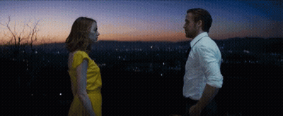 Man And Woman Looking Into Each Other's Eyes GIF