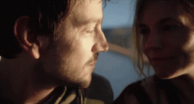 Man And Woman Looking Into Each Other's Eyes GIF