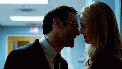 Man And Woman Looking Into Each Other's Eyes GIF