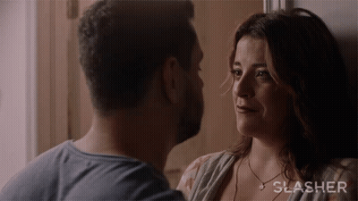 Man And Woman Looking Into Each Other's Eyes Slasher GIF