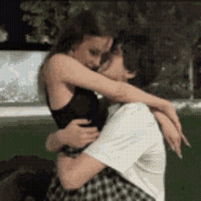 Man And Woman Looking Into Each Other's Eyes GIF