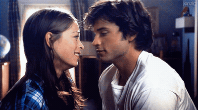 Man And Woman Looking Into Each Other's Eyes With Kenzig GIF