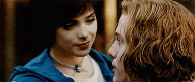 Man And Woman Looking Into Each Other's Eyes Woman In Blue Jacket GIF