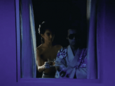 Man And Woman Looking Out Window GIF