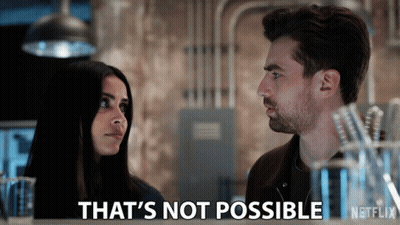 Man And Woman Looking That's Not Possible GIF