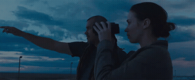Man And Woman Looking Through Binoculars At Cloudy Sky GIF
