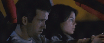 Man And Woman Looking Under Car Hood Saying You Wouldn't Have That Problem GIF