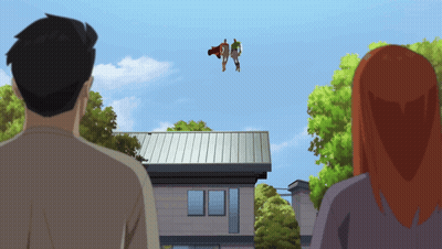 Man And Woman Looking Up At Superhero Over House GIF