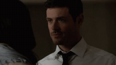 Man And Woman Looking, Woman In Scarf GIF