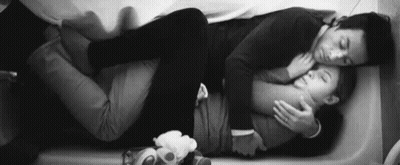 Man And Woman Lying In Bathtub GIF