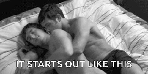 Man And Woman Lying In Bed GIF