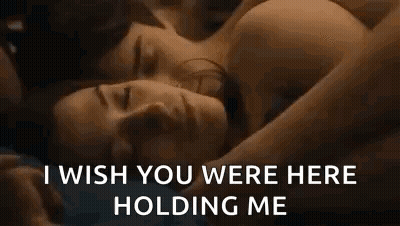 Man And Woman Lying On Bed GIF
