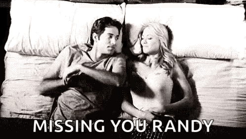 Man And Woman Lying On Bed GIF
