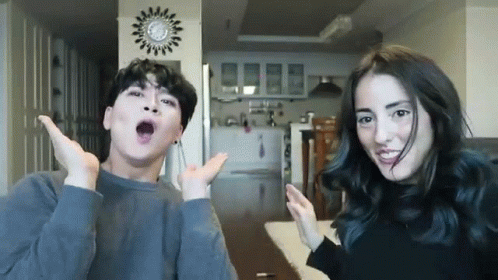 Man And Woman Making Funny Faces GIF