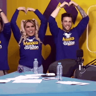 Man And Woman Making Heart Shape In Mexico Shirts GIF