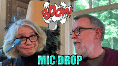 Man And Woman Next To Boom Sign GIF