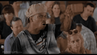 Man And Woman Next To Boooooo Sign GIF