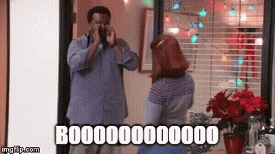 Man And Woman Next To Boooooo Sign GIF