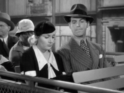 Man And Woman On Bench In Black And White Photo GIF