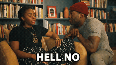 Man And Woman On Couch Saying Hell No GIF