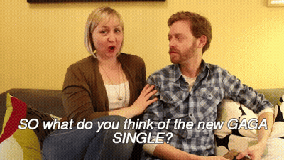 Man And Woman On Couch Saying So What Do You Think Of The New Gaga Single GIF