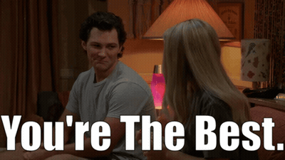 Man and Woman on Couch Saying You're the Best
