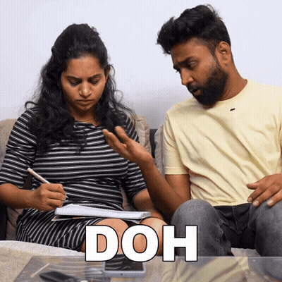 Man And Woman On Couch With Doh Above GIF