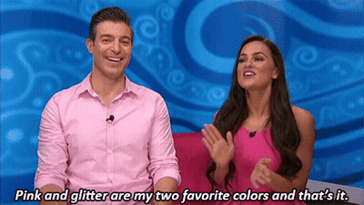 Man And Woman On Pink Couch Saying Pink And Glitter Are My Two Favorite Colors GIF