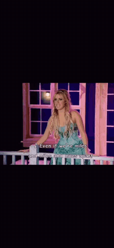 Man And Woman On Porch Saying All I Want Is You GIF